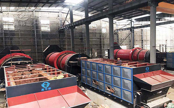 At present, the sludge dryer is specialized in sludge treatment. Compared with the traditional sludge treatment method, the equipment has high work efficiency, and the sludge drying effect is good after using the sludge dryer, which greatly reduces the cost of manual input and sludge treatment. At present, the low utilization rate of heat energy of sludge dryer has been a difficult problem for dryer manufacturers. In order to solve the heat energy utilization rate of sludge dryer equipment, Jiaozuo ZJN has carried out a series of upgrading and improvement of the equipment, which are mainly reflected in the following aspects:  1. Increase crushing and breaking device. The purpose of the device is to prevent the sludge from being sticky again, so as to prevent the sludge from sticking again.  2. Improvement of lifting plate. The movable grate and movable plate lifting devices are placed inside the equipment. When the sludge is dried, the device swings left and right with the rotation of the equipment. The movable plate lifting device has the function of lifting and preventing sticking. It can greatly improve the heat exchange between sludge and heat energy and improve the utilization rate of heat energy.  3. Insulation layer of sludge dryer cylinder. The drum of sludge dryer is wrapped with asbestos to prevent heat loss inside the equipment, which can also save heat energy.  This is the newly developed "rotary harrow three cylinders multiple-loop" sludge dryer developed by Jiaozuo real energy saving company. The equipment has a special design concept and good energy-saving effect. It uses three sleeve structure and "W + s" feeding process to make the sludge do reciprocating work in the drying process. The sludge dryer can control the sludge and hot air to do "advance, retreat, forward, reverse, lift and turn" mixed movement inside the equipment. It is reasonable, orderly and mutually supportive. It can realize the drying purpose of fast, high production efficiency and energy saving.
